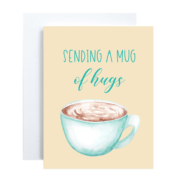 blue watercolor coffee mug filled with coffee friendship card that says sending a mug of hugs with a white A2 envelope