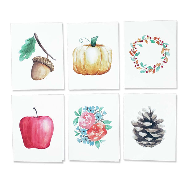 Watercolor painted notecards in fall autumn designs including an acorn with leaf, orange pumpkin, fall foliage wreath, red apple, fall floral bouquet and pinecone