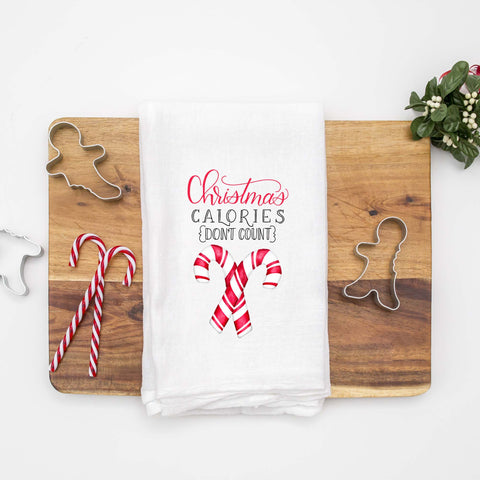 Floursack Kitchen Tea Towel with watercolor candy canes that says Christmas calories don't count