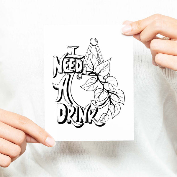 I need a drink potted pothos plant black and white illustrated greeting card on a white folded card with A2 envelope shown with a woman in a white sweater holding the card