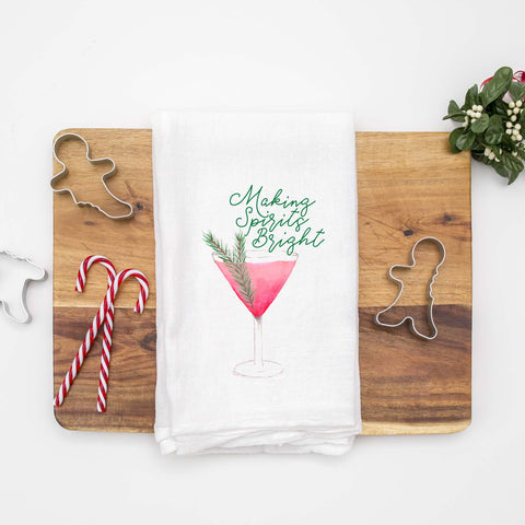Floursack Kitchen Tea Towel with a watercolor Christmas cocktail and says Making spirits bright