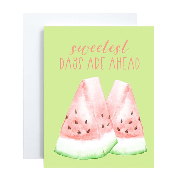 watercolor pink and green watermelon slices on a greeting card that says sweetest days are ahead with a white A2 envelope