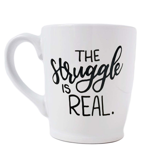 16 oz hand painted white ceramic coffee mug that says the struggle is real in black hand lettering